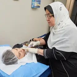 Dr Maysa Abu Laban providing an injectables treatment-1