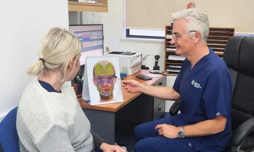 Dr Stephen Wassall performing a cosmetic consult