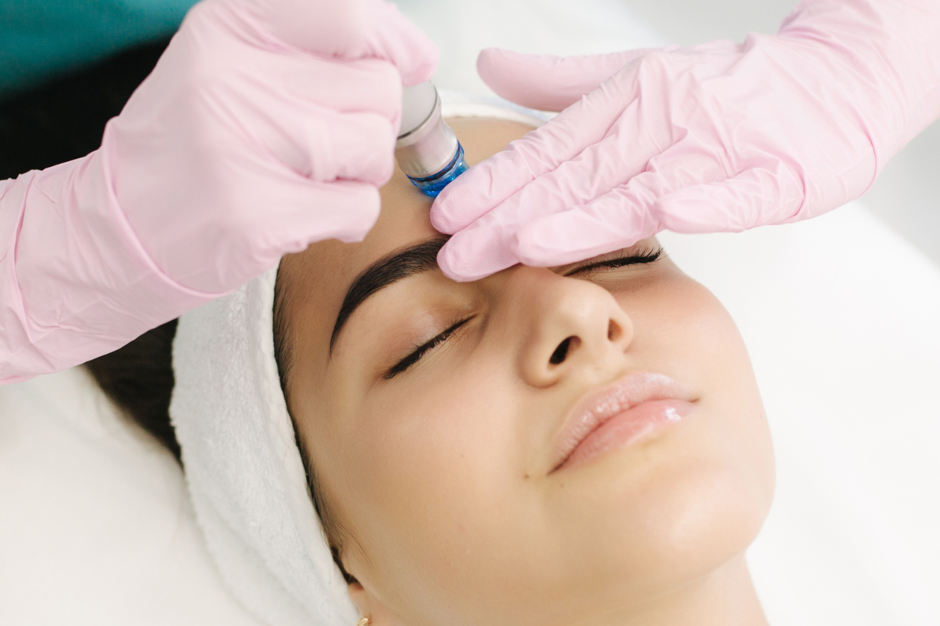 Young woman receiving HydraFacial