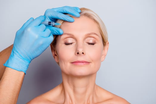 botox awi injections injectables woman face gloves wrinkles