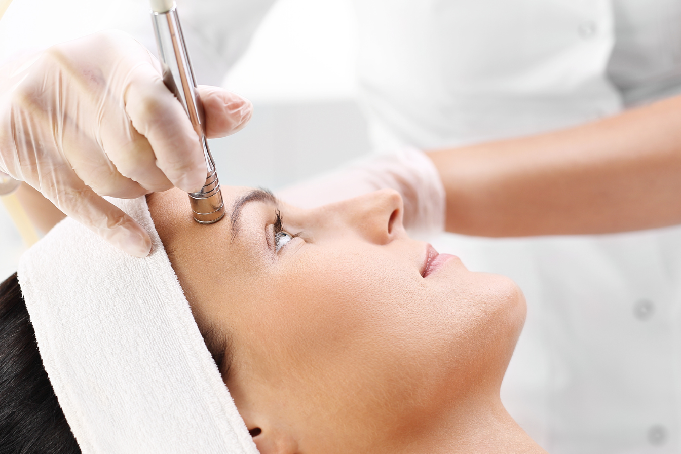 Woman receiving Microdermabrasion