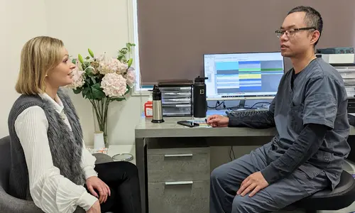 Dr Chu consult with patient