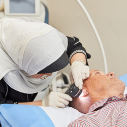 Dr Maysa Abu Laban conducting a skin check-1